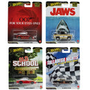 Four Hot Wheels Pop Classics die-cast cars in their original blister packaging, featuring Leto's Convert Turbo, '79 Chevy Blazer Custom / Personalite', '77 Pontiac Firebird TX', and '69 Chevelle SS 396'. The packages feature themed graphics including a red 007 design, a blue Jaws shark, an Old School diner scene, and a Talladega checkered flag.