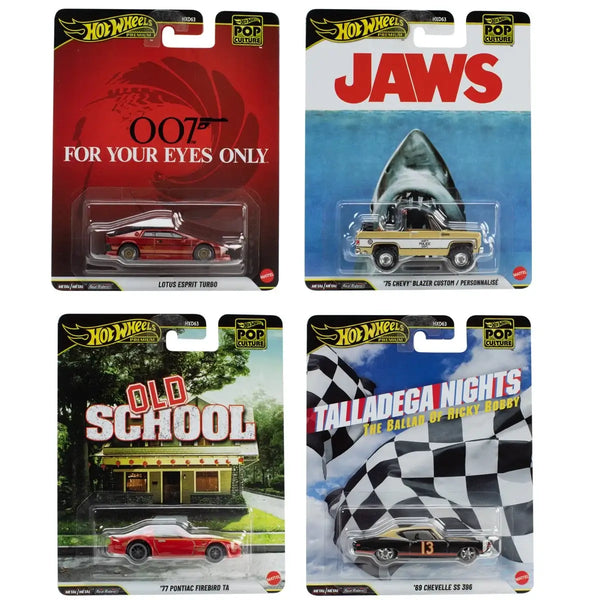 Four Hot Wheels Pop Classics die-cast cars in their original blister packaging, featuring Leto's Convert Turbo, '79 Chevy Blazer Custom / Personalite', '77 Pontiac Firebird TX', and '69 Chevelle SS 396'. The packages feature themed graphics including a red 007 design, a blue Jaws shark, an Old School diner scene, and a Talladega checkered flag.