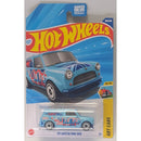 Hot Wheels '67 Austin Mini Van in packaging with blue car and colorful design.