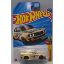 Hot Wheels Mazda toy car in packaging with blue and yellow design