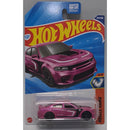 Hot Wheels purple car in packaging with blue and red design
