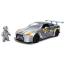 collectible car with mechagodzilla figure on a white background