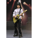 Keith Richards Action figure with a guitar on a stage background