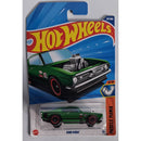 Hot Wheels toy car King Kuda in packaging with green car and blue background