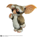 Gremlins 2: The New Batch Lenny Mogwai Prop Replica, standing to the side with right hand towards chest and lower chin
