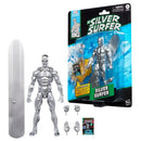 Silver Surfer action figure with packaging and accessories on a white background