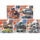 A set of six Matchbox Working toy dump trucks in their original blister packaging, displayed against a clean white background.
