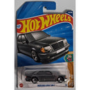 Hot Wheels Mercedes-Benz 500 E toy car in packaging with blue and red design