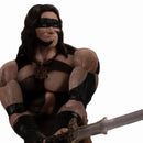 Mezco Toyz Conan The Barbarian (1982): War Paint Edition One:12 Collection Action Figure holding his sword inn stance pose