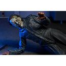Halloween The Curse of Michael Myers Ultimate NECA Action Figure lying on floor with green ooze on mask