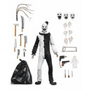 Terrifier Art the Clown Ultimate 7-Inch Scale NECA Action Figure pictured with accessories which include trash and additional heads and hands