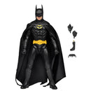 Batman action figure with cape and accessories on a white background