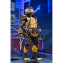 TMNT Yi Action figure of a turtle character with weapons on a dark background