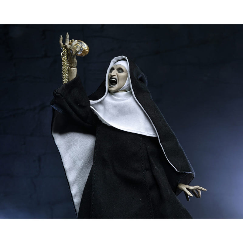 NECA Ultimate Valak (The Nun, Conjuring Universe) 7-Inch Scale Action Figure, unpackaged holding up orb accessory