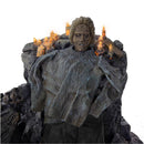Statue of Pamela Voorhees with candles on a white background