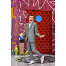 Pee-wee Herman Ultimate NECA 7-Inch Scale Action Figure standing with mouth wide open and one leg kicked slightly back with toes to floor and the other foot planted flat on floor