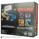 Box packaging for Gremlins 2 with character images and text.