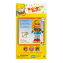Rainbow Brite 40th Anniversary toy packaging box, showing the character with blonde hair, a blue and red dress, and yellow shoes on a yellow background with Spanish text.