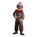 Colorful clown figurine with a striped suit on a white background