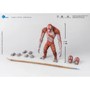 Skar King Action figure with red and brown skin, surrounded by small parts and a pencil for scale on a white background.