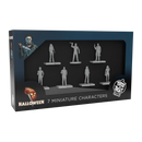 Halloween miniature character set in retail packaging, featuring 7 unpainted gray plastic figurines displayed through a clear window on a dark box with Halloween-themed graphics.