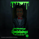Goosebumps 'Night of the Living Dummy' Slappy Ventrilogist Dummy action figure in its original window box packaging, featuring a dark gray suit, white shirt, red bow tie, and glowing green eyes, with green slime dripping graphics on the box.