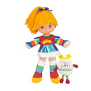 A colorful plush doll with bright orange yarn hair, blue eyes, and a rainbow-themed outfit, standing next to a small matching plush character on a plain white background.