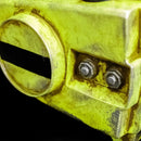 Close-up of a yellow mechanical component with bolts on a black background