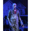 Tiny Character in overalls with a blue-lit background