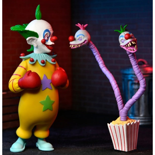 NECA Toony Terrors 6" Scale Action Figures Series 7 Assortment, Shorty from Killer Klowns From Outer Space turning to look at popcorn monster