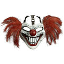 Scary clown mask with red hair and a red nose on a white background