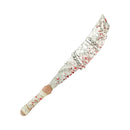 Decorative knife with white handle and red specks on a white background
