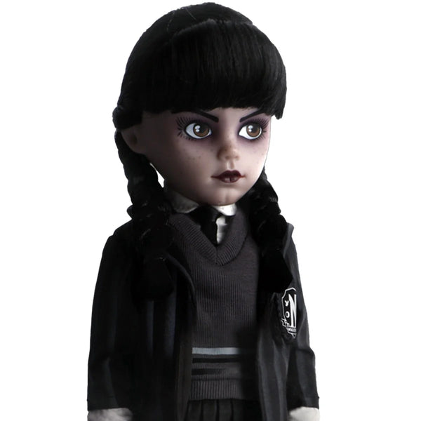 Wednesday Doll with dark hair styled in pigtails, wearing a black outfit with a white shirt underneath on a white background.