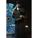 Wednesday Addams and Enid 8-Inch Clothed NECA Action Figure 2-Pack, Wednesday holding a book