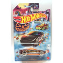 Hot Wheels Alpha Puruli die-cast toy car in its original blister card packaging, featuring a Halloween-themed design with a jack-o'-lantern and candy graphics.