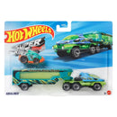 Hot Wheels Super Rigs Swamp Race Team toy truck and trailer set in its original blister card packaging, featuring a green and blue truck with a teal trailer.