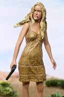 Baby Firefly Figure of a woman in a gold dress with a gun, standing against a desert background
