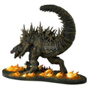 Godzilla creature with flames on a white background