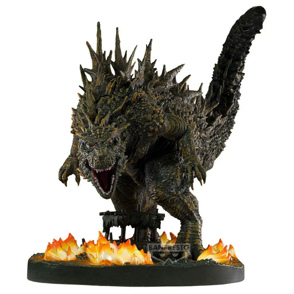 Godzilla figurine with flames on a white background