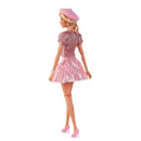 Barbie doll in a pink outfit with a beret on a white background