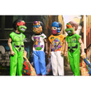Four Ben Cooper action figures in colorful costumes standing in front of a graffiti-covered wall.