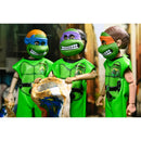 Three Ben Cooper action figures in green costumes with masks, standing in a forest setting.