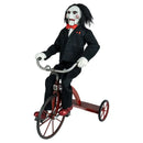 Figurine of a character in a suit riding a vintage bike on a white background