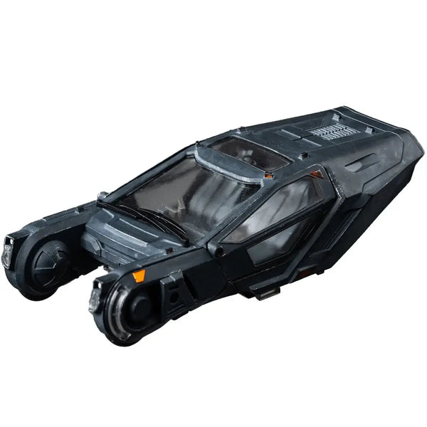 Black and gray spinner vehicle on a white background