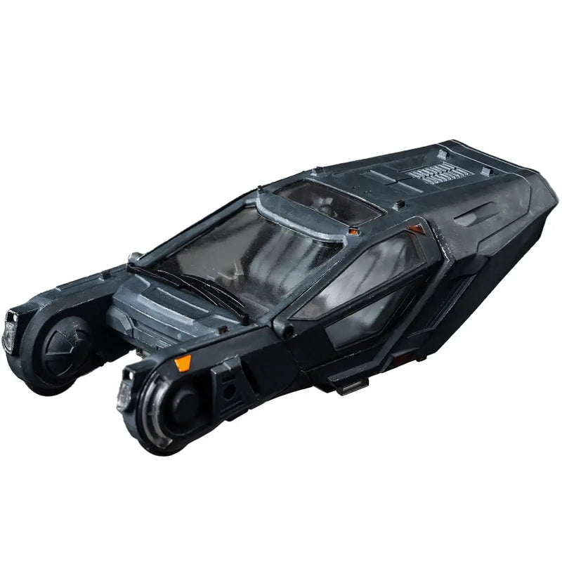 Black and gray spinner vehicle on a white background
