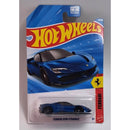 Hot Wheels Ferrari SF90 Stradale toy car in packaging on a white background