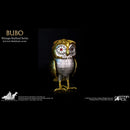 A vintage-style owl figurine from Star Ace's Bubo collection, featuring a gold and silver mosaic pattern with a red star detail in one eye and a black star detail in the other. The figurine is set against a solid black background with product information text on the left.