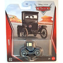 Mattel Disney Pixar Cars Lizzie collectible metal die-cast toy car in its original blister card packaging, featuring a vintage black car with eyes on the front of the card.