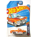 Hot Wheels Drag Racers Custom '72 Chevy Luv die-cast toy car in its original blister card packaging, featuring an orange and white truck design with blue stripes.