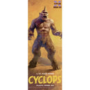 Vertical packaging artwork for an X-Plus model kit of a cyclops creature, showing a muscular one-eyed ape-like monster standing against a warm yellow-brown background with the text 'CYCLOPS' and 'PLASTIC MODEL KIT' at the bottom.